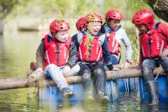group-of-cubs-on-raft-jpg-2000x1334
